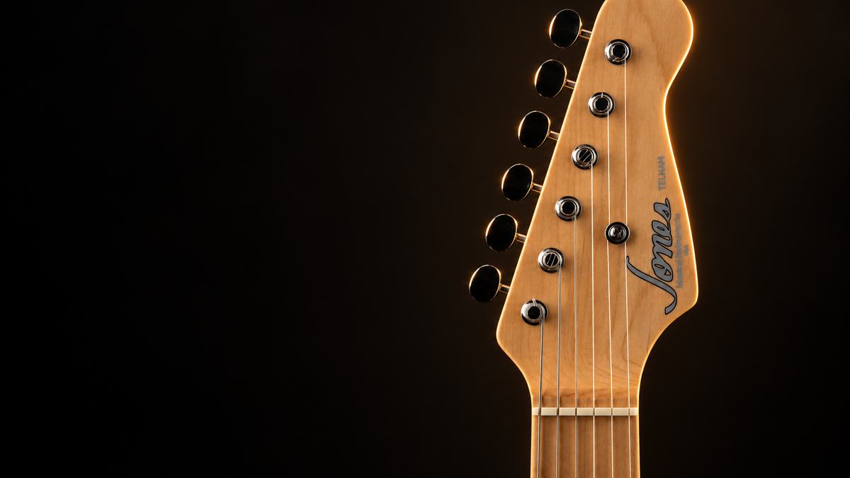 Close-up of a Jones maple headstock and tuners